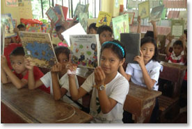 Children receive donated books in the Philippines